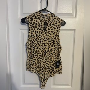 Express One Eleven body suit. Brand new with tags